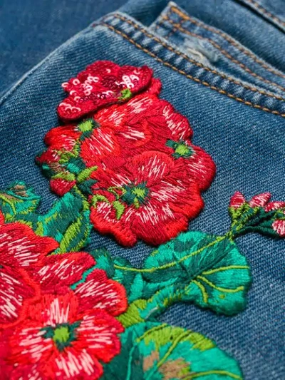Shop Dolce & Gabbana Floral Appliqué Skinny Jeans In Blue