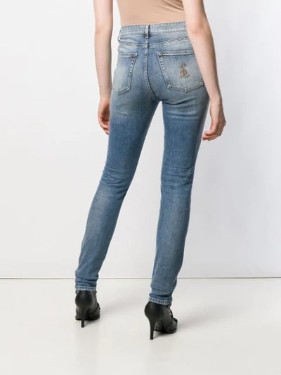Shop Saint Laurent Sl Embroidered Skinny Jeans In Blue
