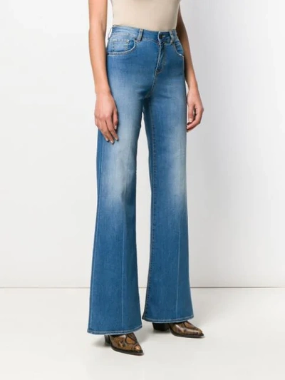 Shop Pinko Flared High Rise Jeans In Blue