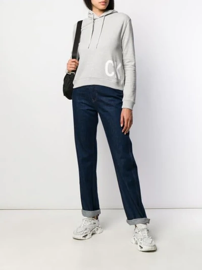 Shop Calvin Klein Jeans Est.1978 Logo Hoodie In 038 Grey