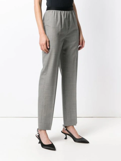 Shop Maison Margiela Micro Houndstooth Check Trousers In Black