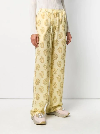 Shop Acne Studios Printed Pyjama Trousers In Yellow