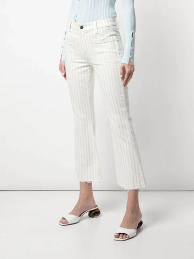Shop Frame Cropped Striped Jeans In Courtyard