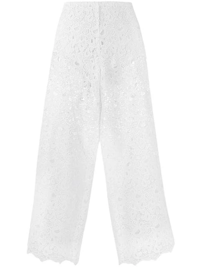 Shop Ermanno Scervino Floral Lace Cropped Trousers In White