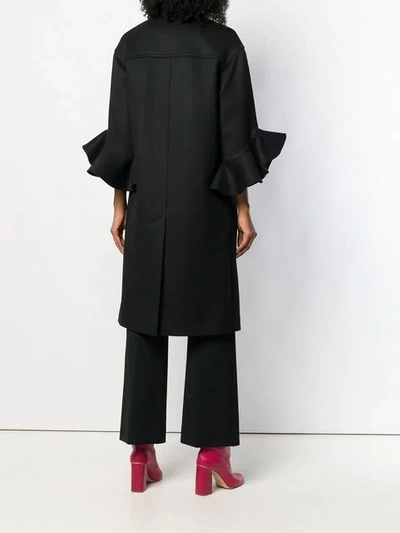 Shop Valentino Ruffle Sleeve Coat In Black