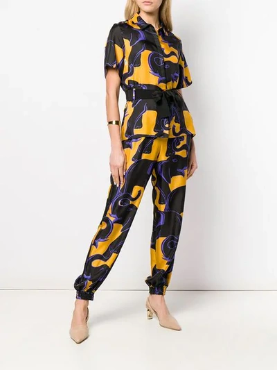 Shop Lanvin Elephant Print Trousers In Black