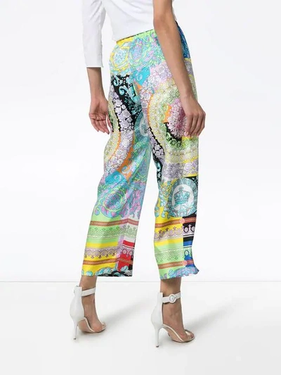 Shop Versace Mixed Floral Print Cropped Trousers In A7000 Multicolor