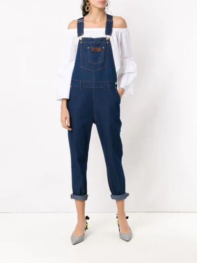 Shop Amapô Bruto Denim Jumpsuit In Blue