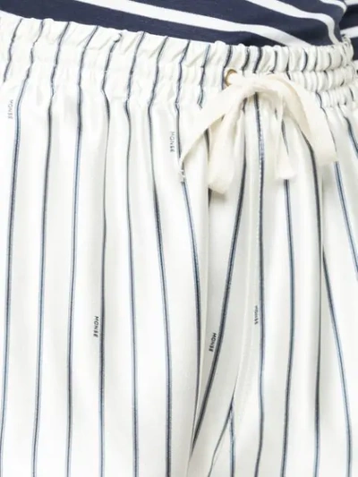 Shop Monse Tie Waist Striped Shorts In White