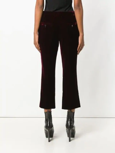Saint Laurent Burgundy Mid Rise Flared Velvet Trousers In Red