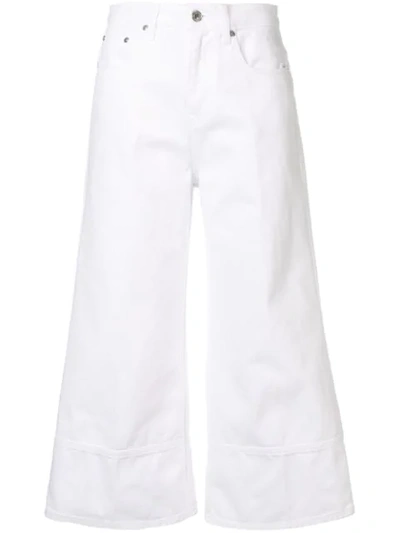 Shop Msgm Cropped Flared Jeans In White