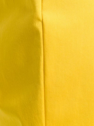 Shop Moschino Slim In Yellow