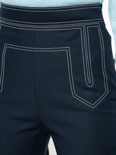 Shop Khaite Stitch Detail Flared Trousers In Blue