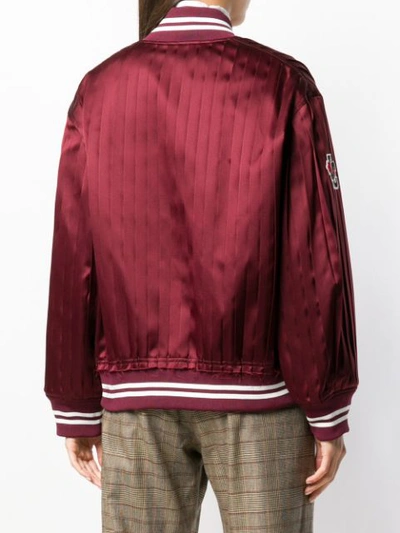 Shop Undercover Satin Bomber Jacket In Red