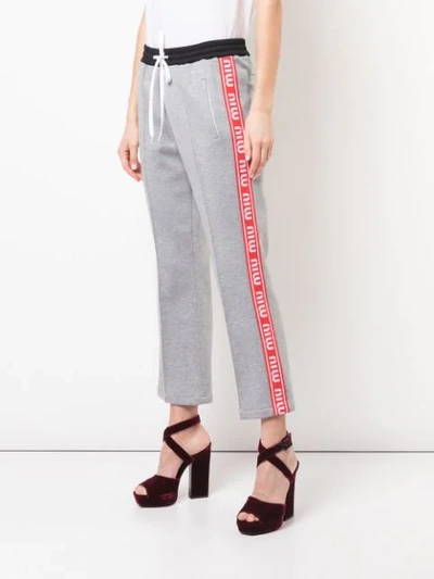 Shop Miu Miu Tapered Trousers In Grey