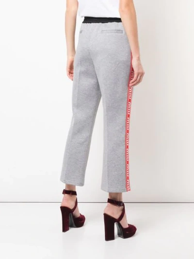 Shop Miu Miu Tapered Trousers In Grey