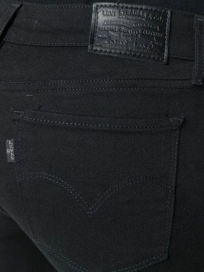 Shop Levi's Flared Jeans In Black