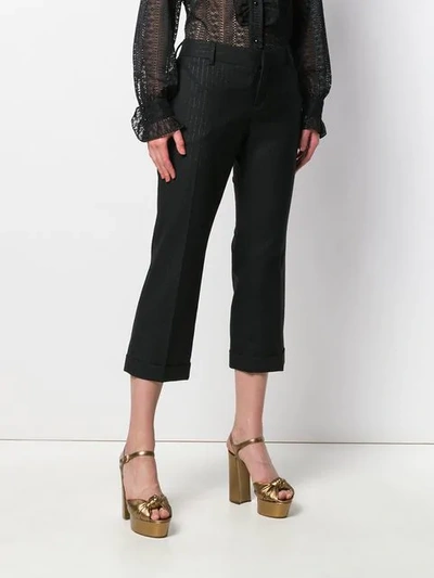 Shop Saint Laurent Cropped Pinstripe Trousers In Black