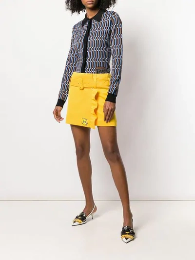 Shop Prada Belted Mini Skirt In Yellow