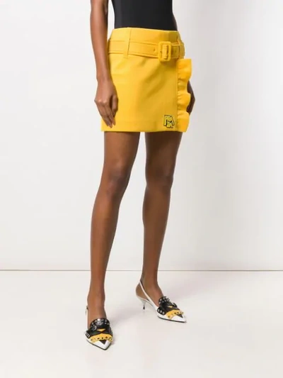 Shop Prada Belted Mini Skirt In Yellow