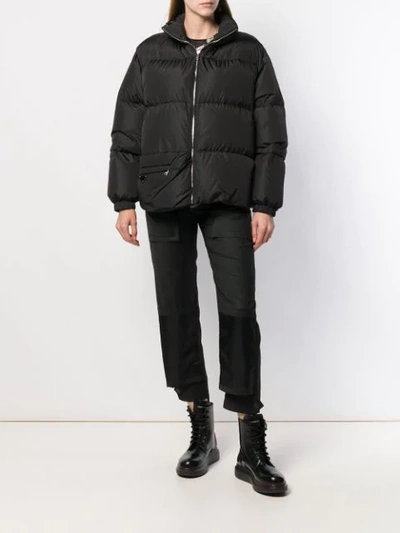 Shop Prada Daunenjacke Mit Stehkragen - Schwarz In Black