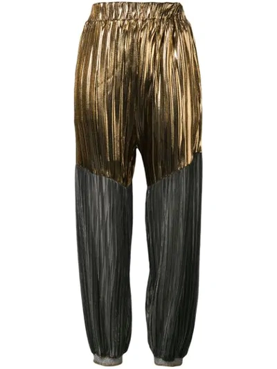 Shop Atu Body Couture Pleated Tapered Trousers In Gold