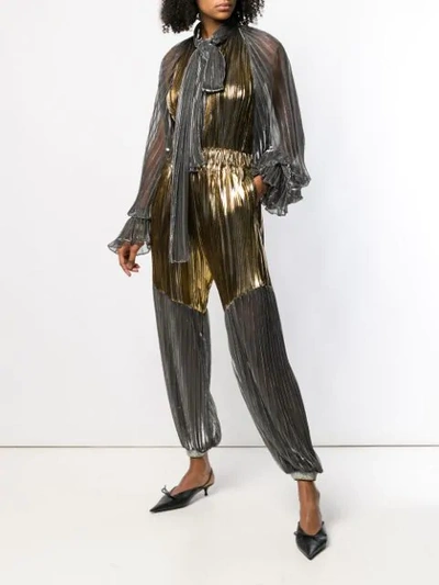 Shop Atu Body Couture Pleated Tapered Trousers In Gold