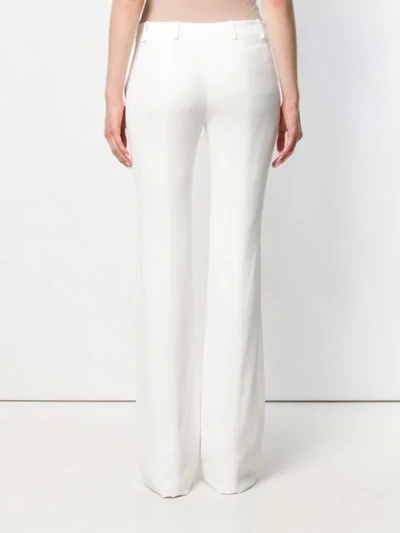 Shop Alexander Mcqueen Flared Tailored Trousers In White