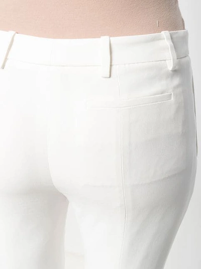 Shop Alexander Mcqueen Flared Tailored Trousers In White