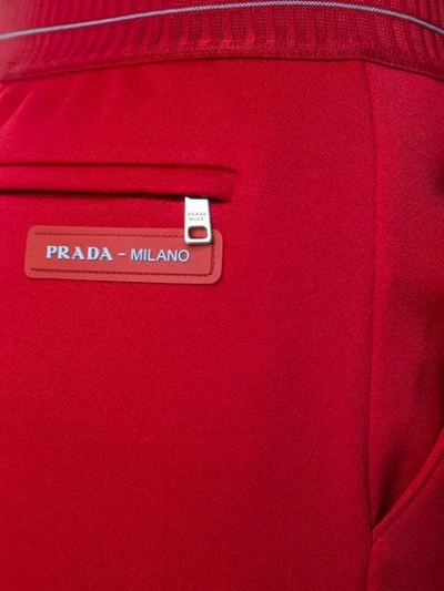 Shop Prada Logo Waistband Track Pants In Red