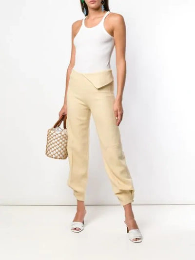 Shop Jacquemus Djalil Trousers In Yellow