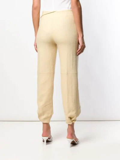 Shop Jacquemus Djalil Trousers In Yellow