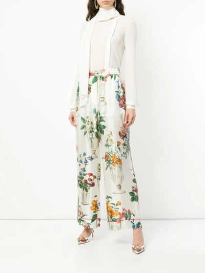Shop Dolce & Gabbana Floral Palazzo Trousers - White