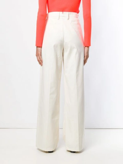 Shop Walk Of Shame Wide Leg Trousers In White
