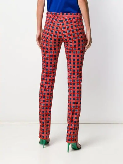 Shop Versace Printed Tailored Trousers In Red