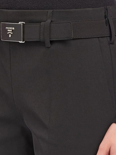 Shop Prada Technical Fabric Trousers In Black