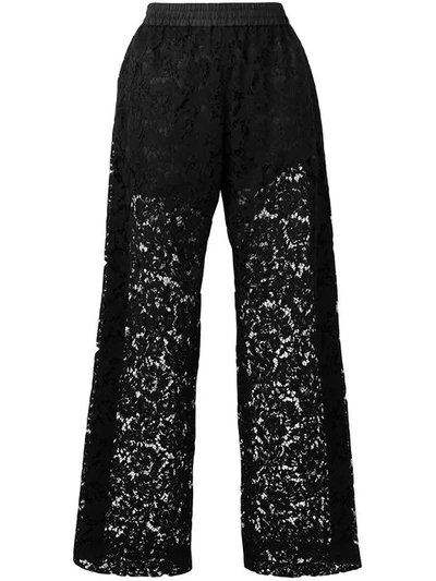 Shop Valentino Wide Leg Lace Trousers In Black