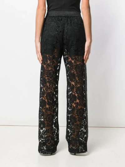 Shop Valentino Wide Leg Lace Trousers In Black