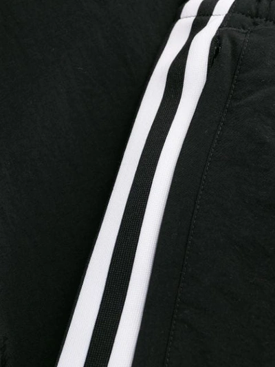 Shop Adidas Originals Track Pants In Black