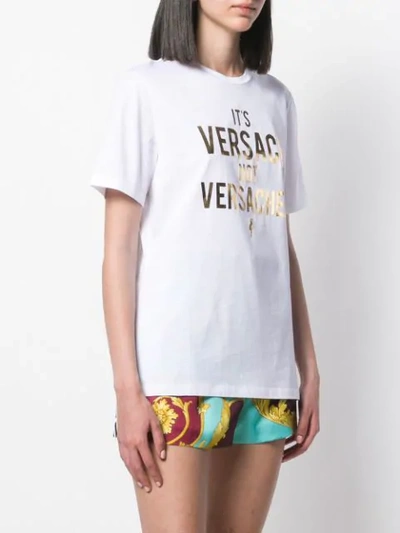 Shop Versace Slogan Print T-shirt In White