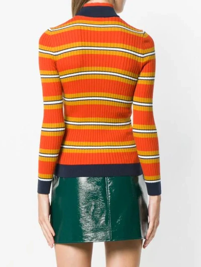 Shop Courrèges Striped Fitted Sweater In Orange