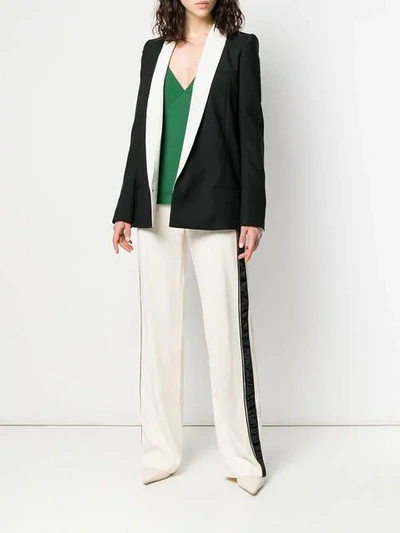 Shop Haider Ackermann Tailored Trousers With Side Stripe In White