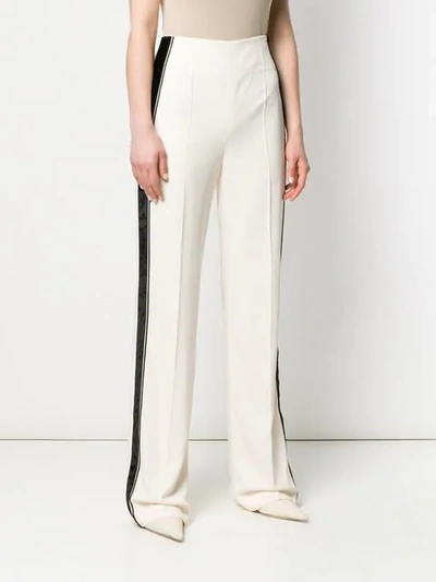 Shop Haider Ackermann Tailored Trousers With Side Stripe In White