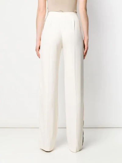 Shop Haider Ackermann Tailored Trousers With Side Stripe In White