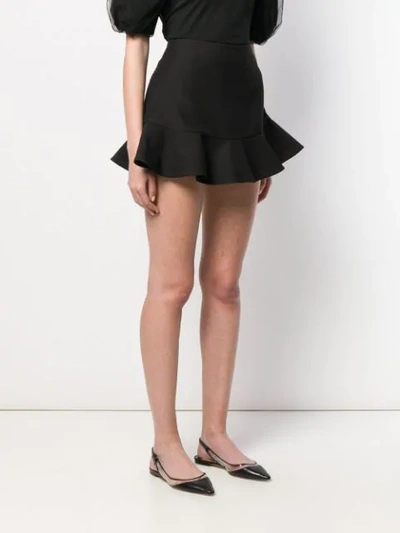 Shop Valentino Peplum Hem Short Shorts In Black