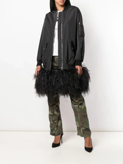 Shop Moschino Feather Embellished Oversized Bomber In Black