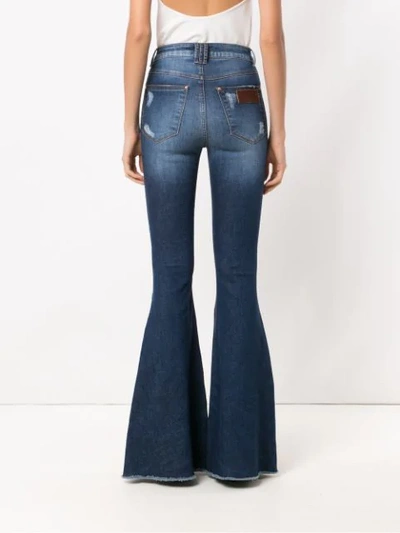 Shop Amapô Maine Super Flared Jeans In Blue