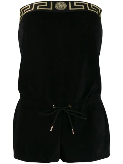 Shop Versace Greca Playsuit In Black