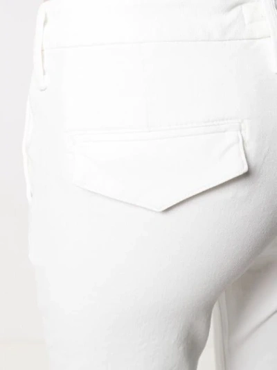 Shop Mother Frayed Cuff Trousers In White