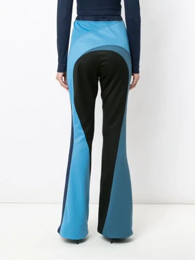 Shop À La Garçonne Panelled Flared Trousers In Blue